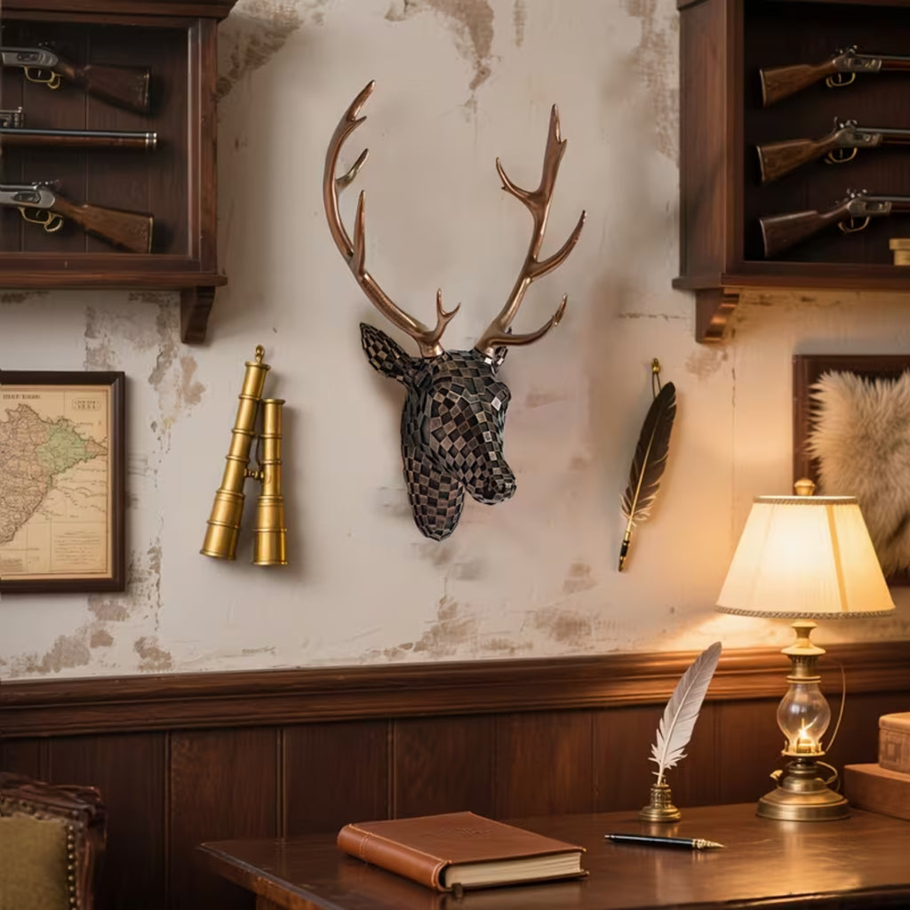 Decorative metal deer head mounted on a wall with hunting trophies and a lamp.