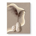 A square wall art print or canvas featuring a minimalist beige composition with two small white vase forms, dried brown pampas grass, and an organic cream-colored illuminated shape on a textured beige background, shown against a white studio backdrop.