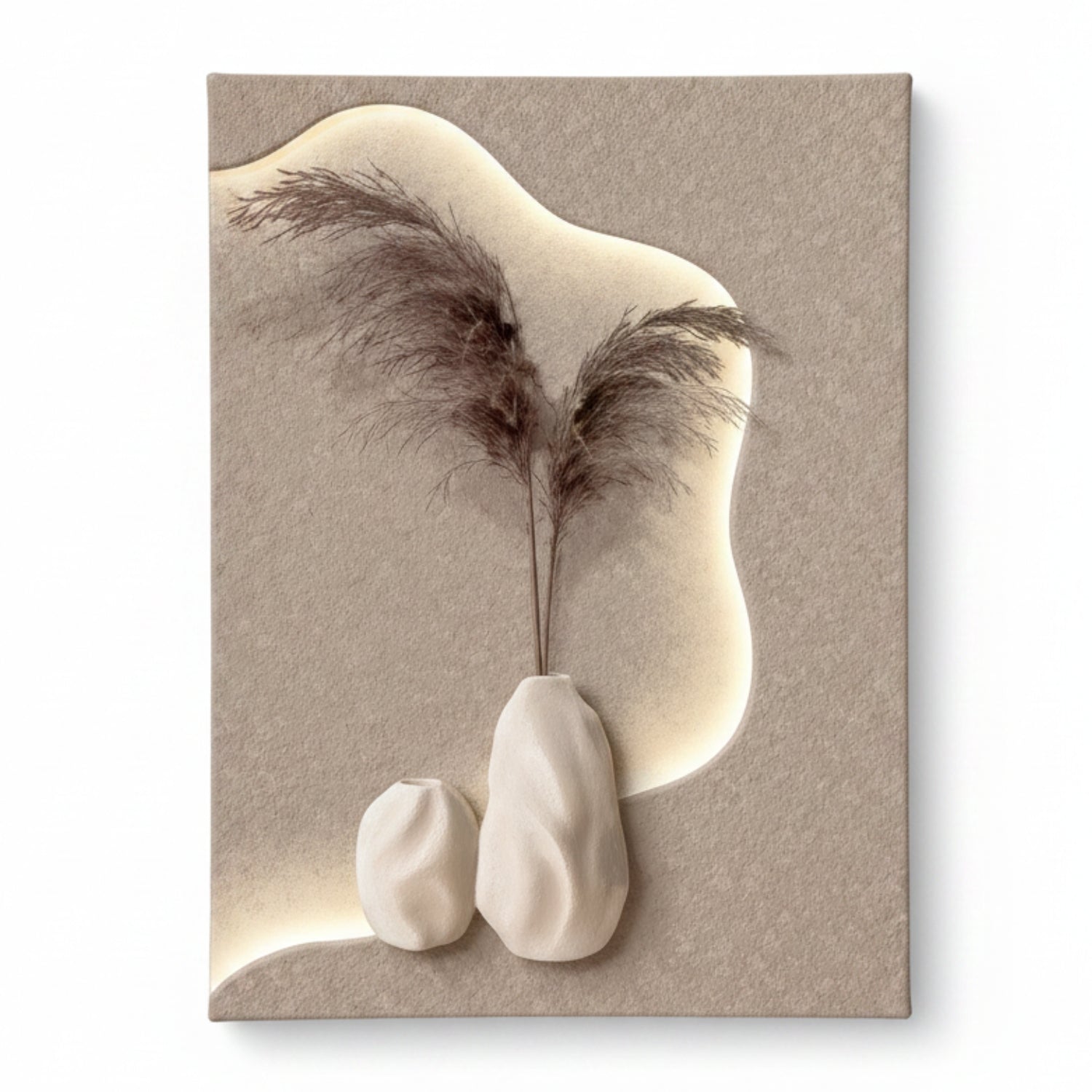 A square wall art print or canvas featuring a minimalist beige composition with two small white vase forms, dried brown pampas grass, and an organic cream-colored illuminated shape on a textured beige background, shown against a white studio backdrop.