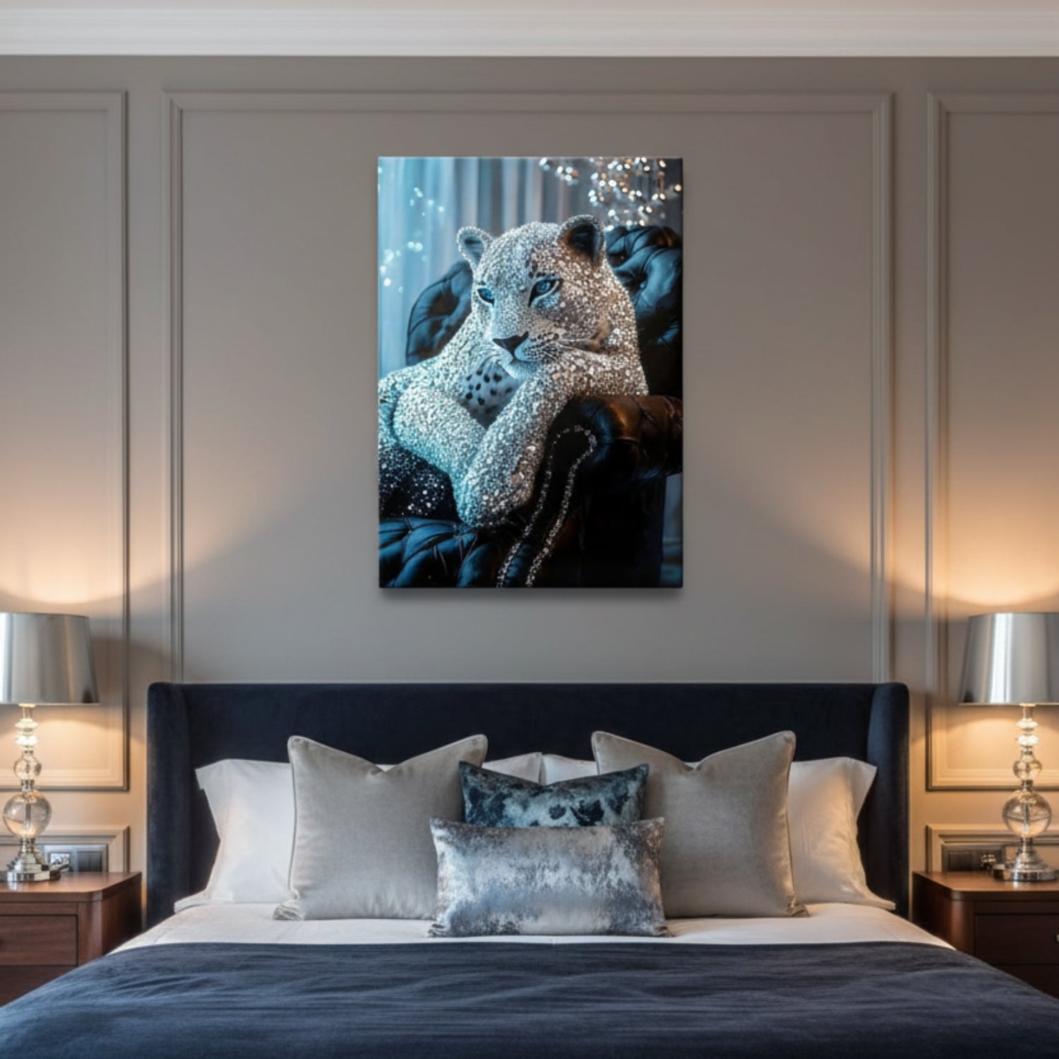 A framed wall art print depicting a glittering silver leopard resting on a dark velvet chair, displayed above a bed in a modern bedroom setting.