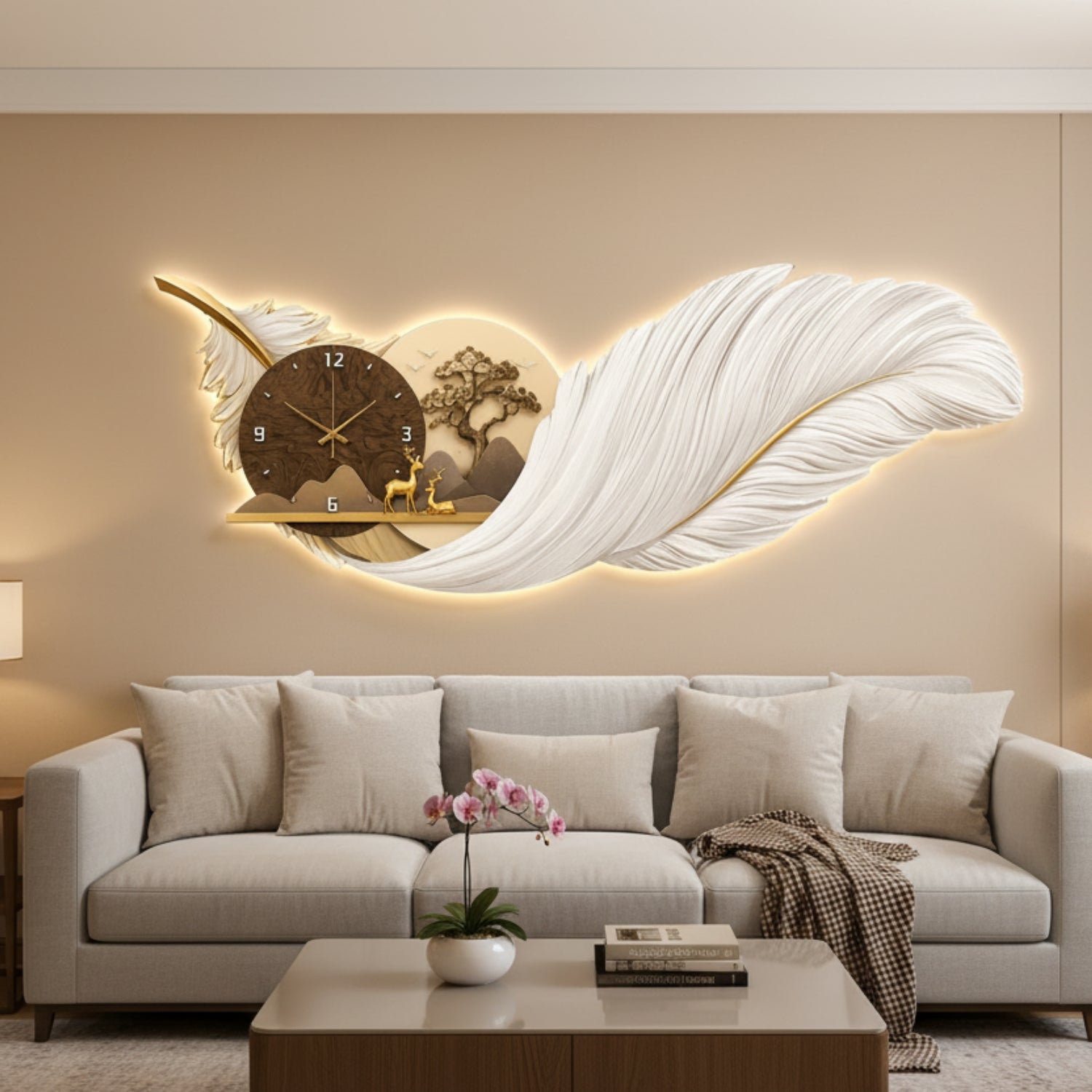 A large illuminated wall clock mounted above a light gray sofa in a modern living room. The clock is shaped like a white feather with a warm golden glow, a small tree motif, and a brown clock face with gold details.