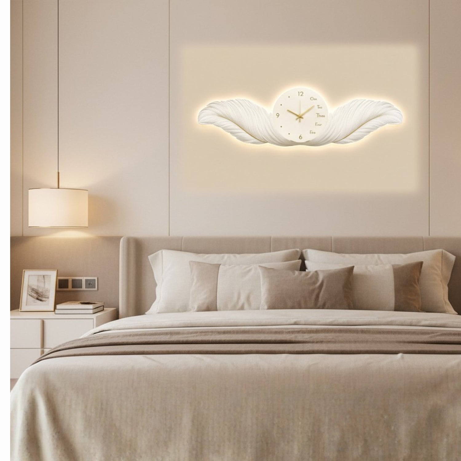 A modern wing-shaped wall clock with a glowing warm light, mounted on a beige wall above a neatly made bed in a minimalist bedroom setting.