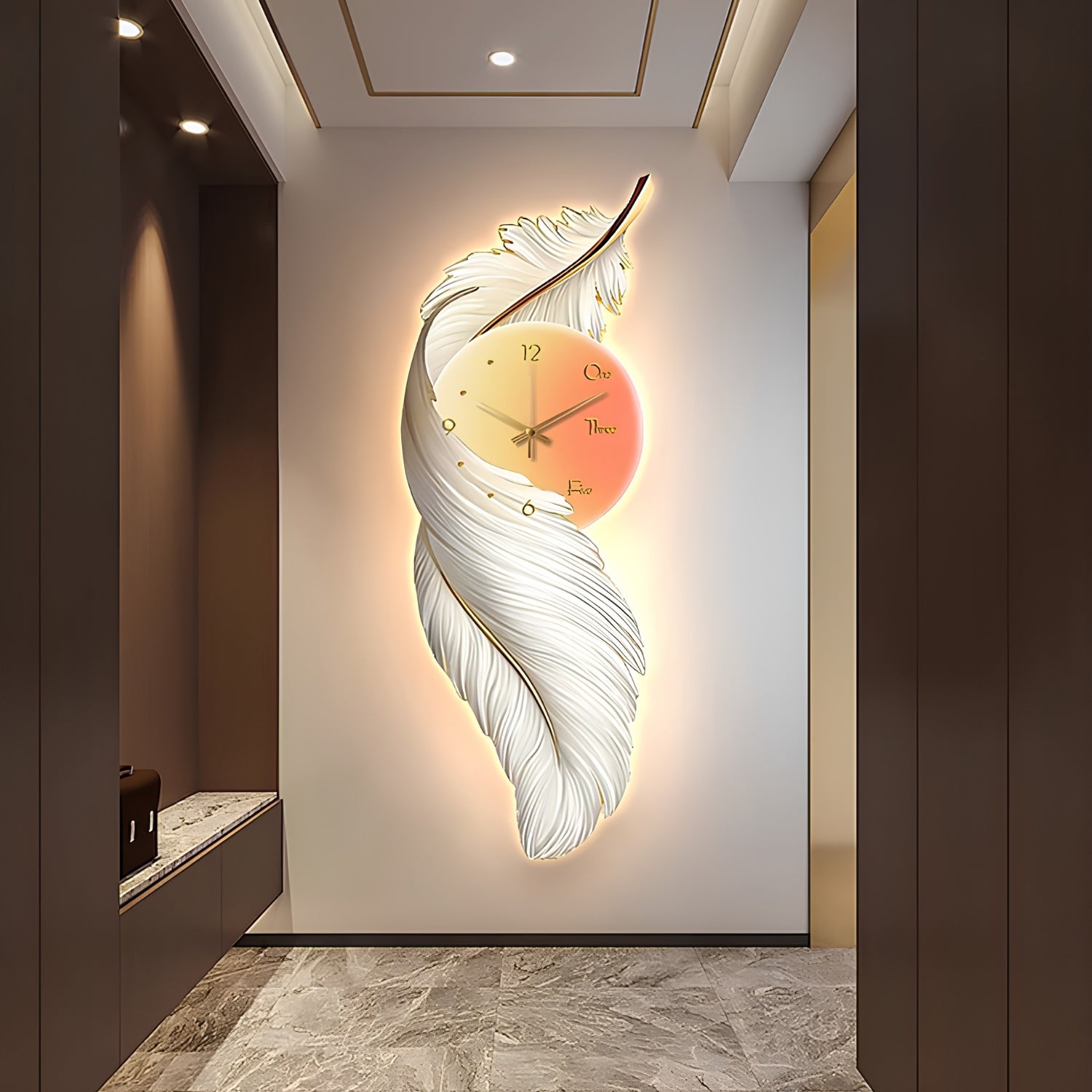 A modern wall clock shaped like a glowing feather in a hallway setting. The clock features a white textured feather silhouette with a warm yellow-to-orange gradient center and gold hands.