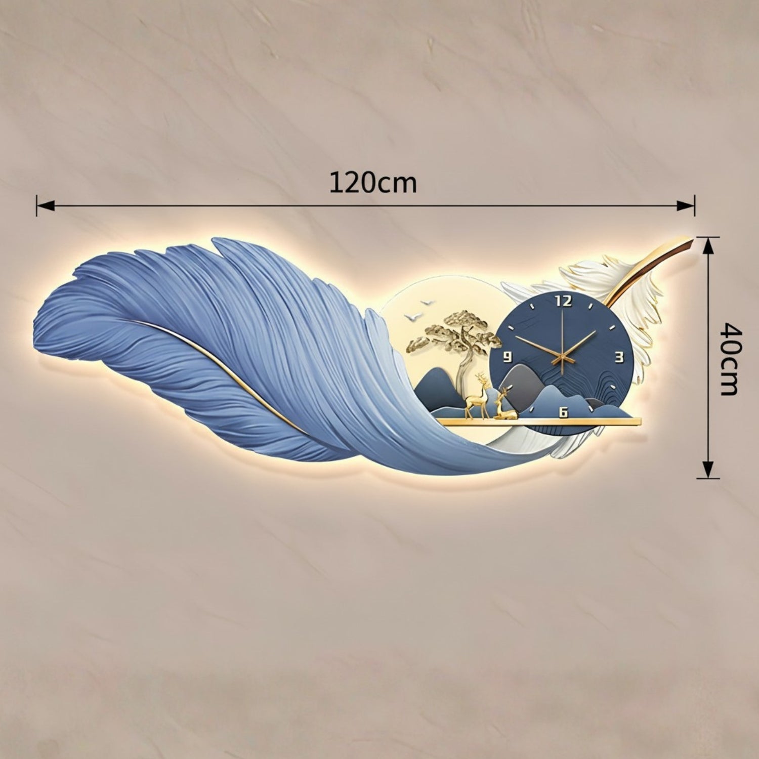 A decorative wall clock shaped like a large blue feather with a built-in clock face and small landscape detail, shown on a beige wall with dimension labels reading 120cm wide and 40cm tall.