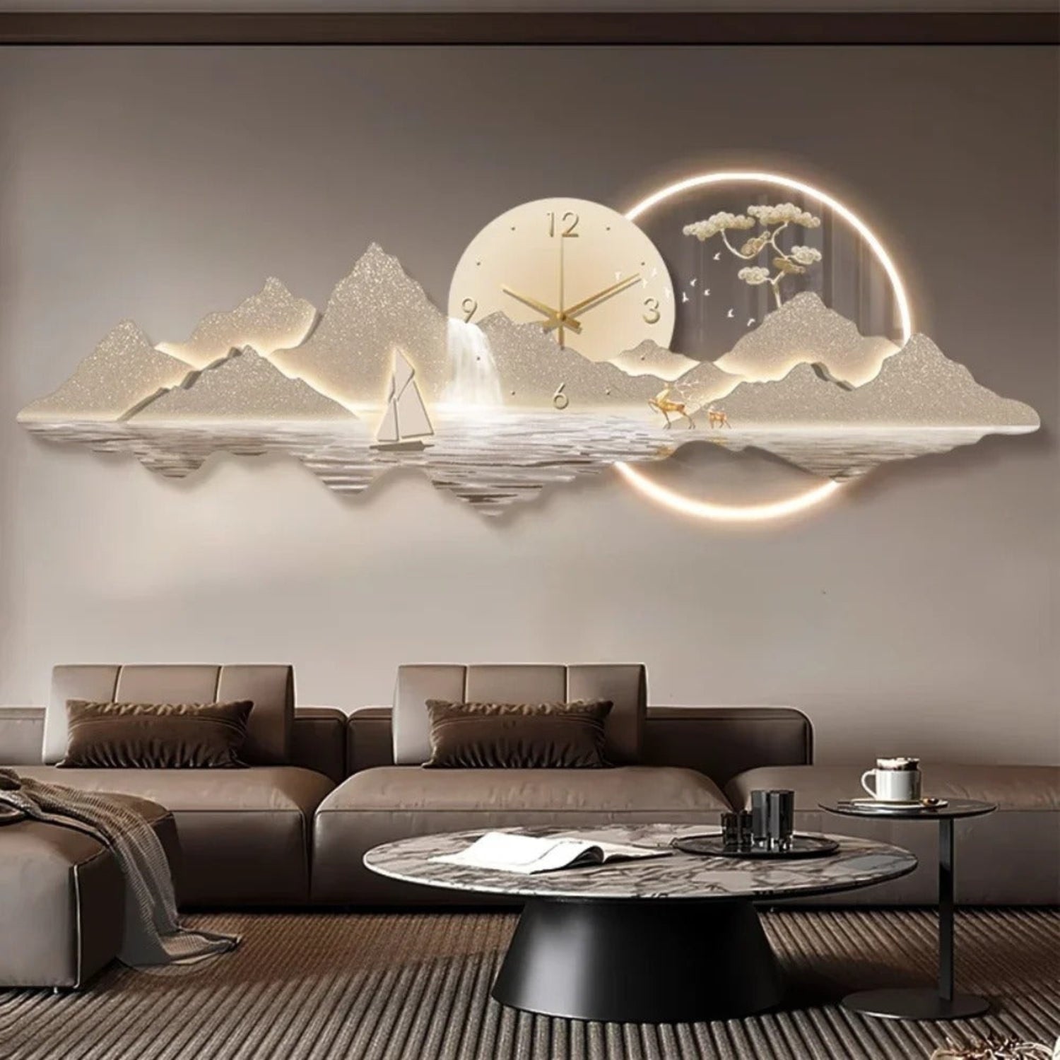 A 3D wall clock featuring a mountain and moon landscape design with a built-in clock face, shown mounted on a wall in a modern living room setting above a brown sofa.