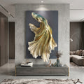 Large vertical wall art featuring a stylized gold and teal fish sculpture on a dark gray background, displayed above a console in a modern living room interior.