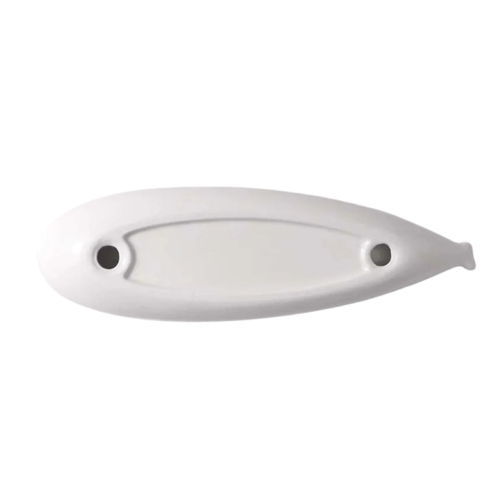 A white plastic fish-shaped wall hook or decorative fixture with two circular mounting holes, shown against a plain white background.