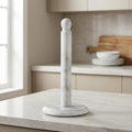 White marble paper towel holder standalone on marble countertop