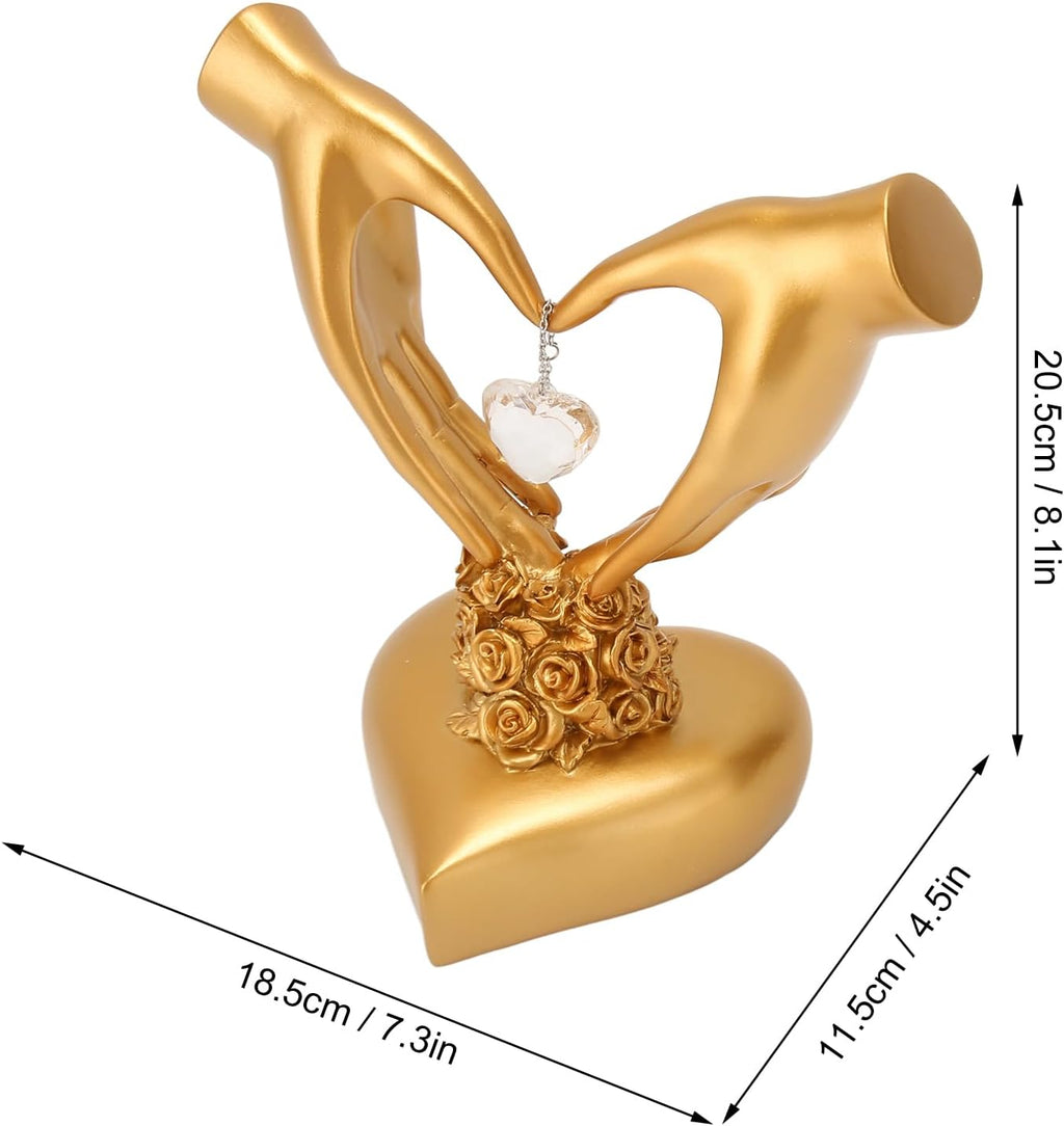 Gold two hands heart sculpture dimensions - 20.5cm H x 18.5cm W x 11.5cm D on white background