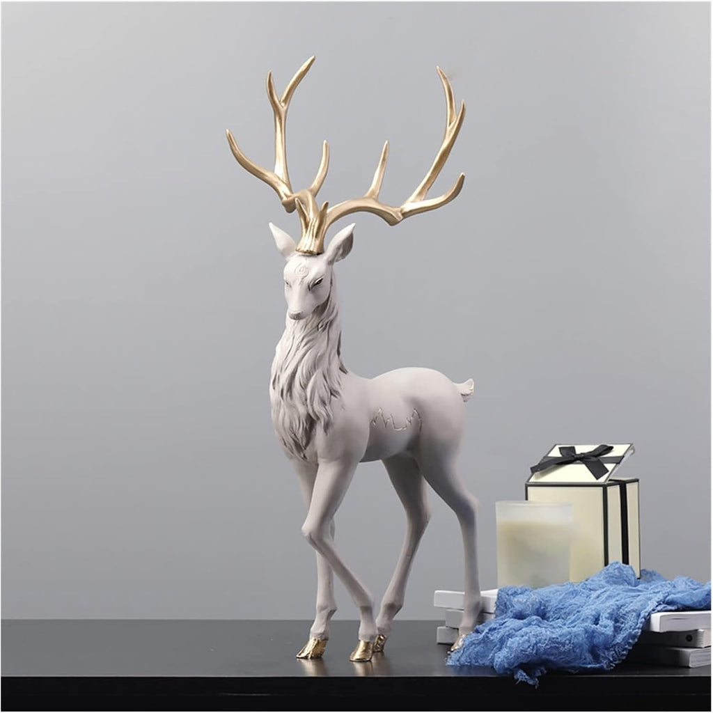 White and gold standing stag deer sculpture 55cm - full view against grey background styled with candle and gift box
