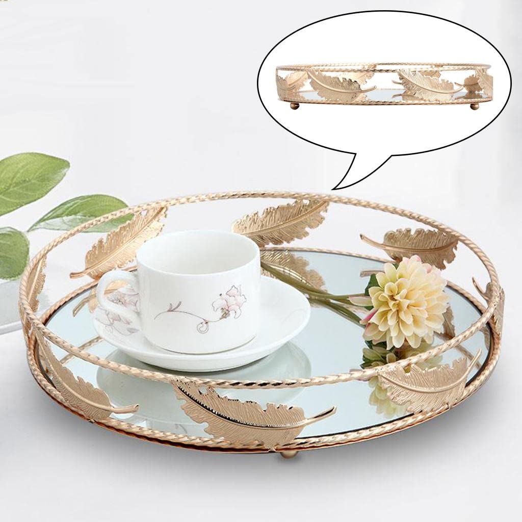 Gold feather leaf round mirror tray styled with teacup and flower