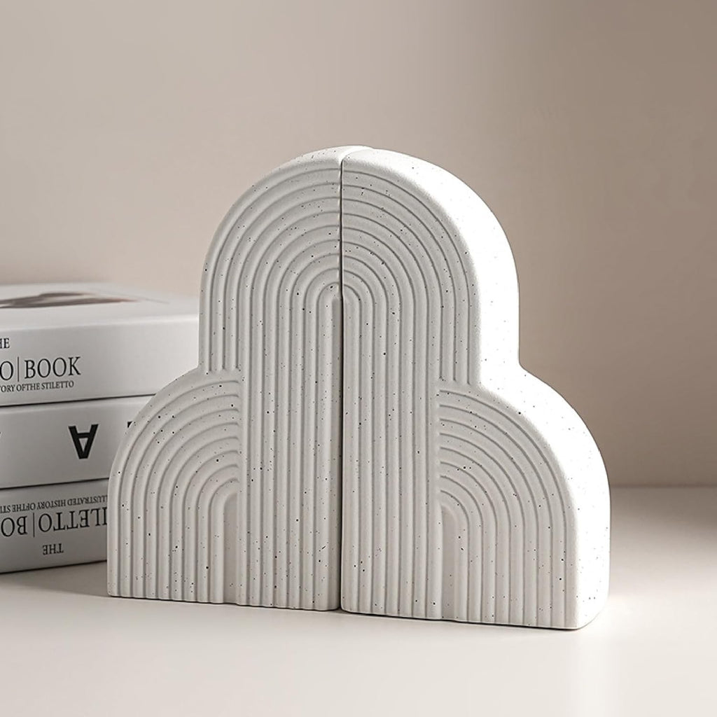 White arch ceramic bookends close-up showing ribbed arch detail and speckled matte finish