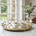 Close up of gold interlocking ring chain frame detail on mirror tray
