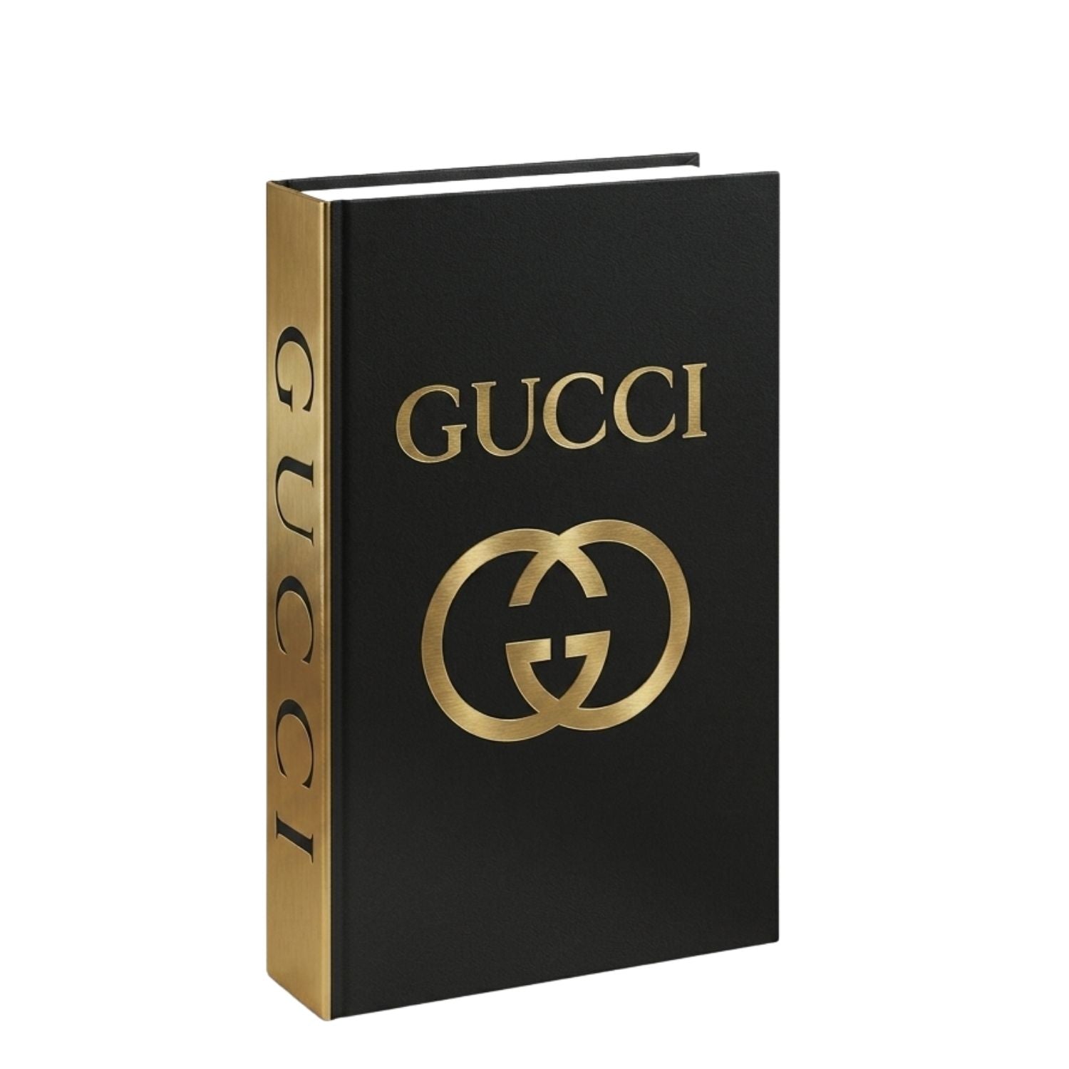 A black Gucci book-style box or book with gold foil branding, including the GUCCI wordmark and interlocking GG logo on the front, plus vertical Gucci text on the spine, shown on a plain white background.