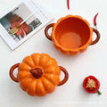 Orange pumpkin-shaped ceramic casserole dish with matching lid and side handles
