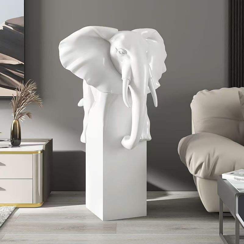 White elephant head sculpture styled in modern living room