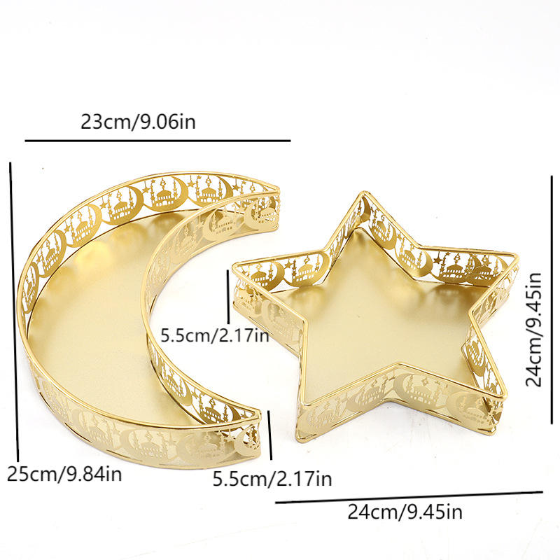Gold star and crescent decorative trays styled with fruit and home accessories