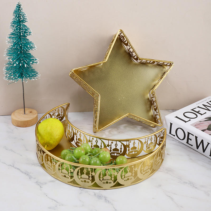 Gold crescent and star decorative trays shown together