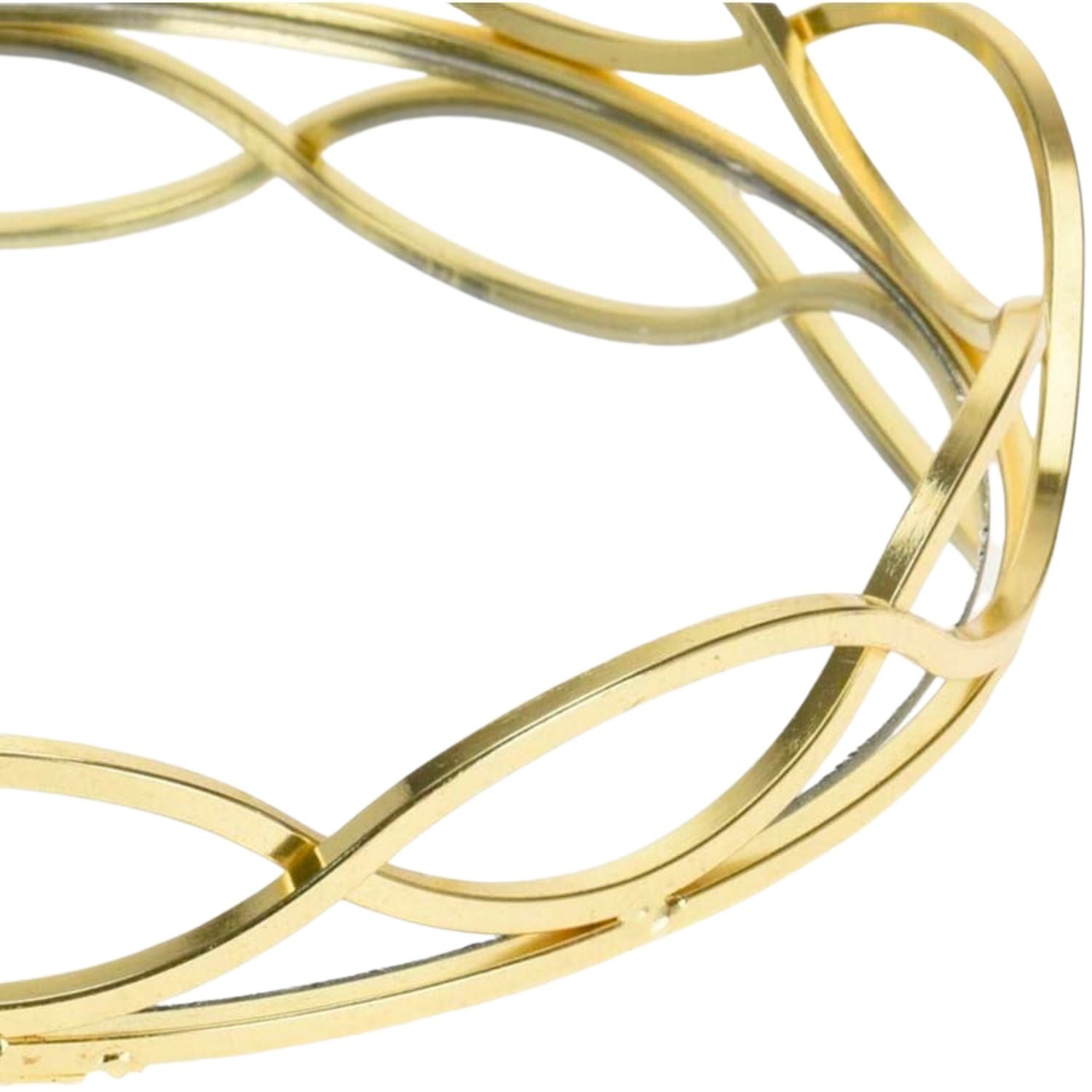 A close-up of a polished gold-toned metal bangle bracelet with an interlocking, flowing openwork design on a plain white background.