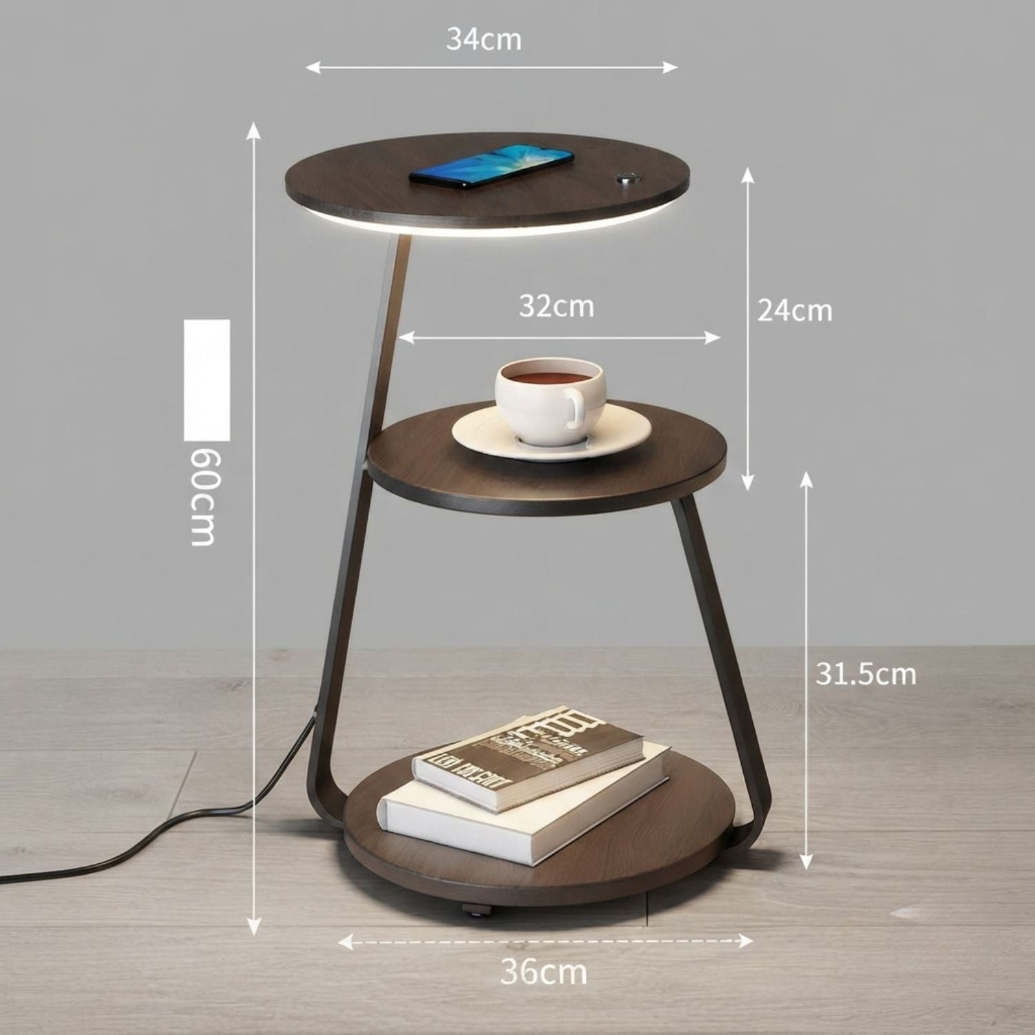 A three-tier round side table with dark wood-look shelves and a black metal frame, shown with dimension labels (34cm, 32cm, 24cm, 31.5cm, 36cm, 60cm) on a gray studio background.