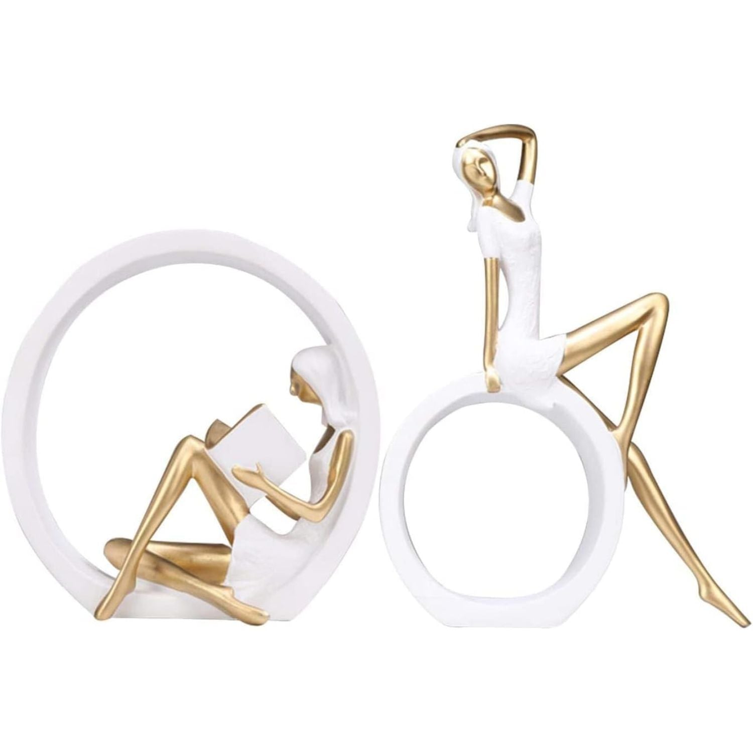 Two white and gold decorative figurines shaped like stylized human figures, displayed on a plain white background.
