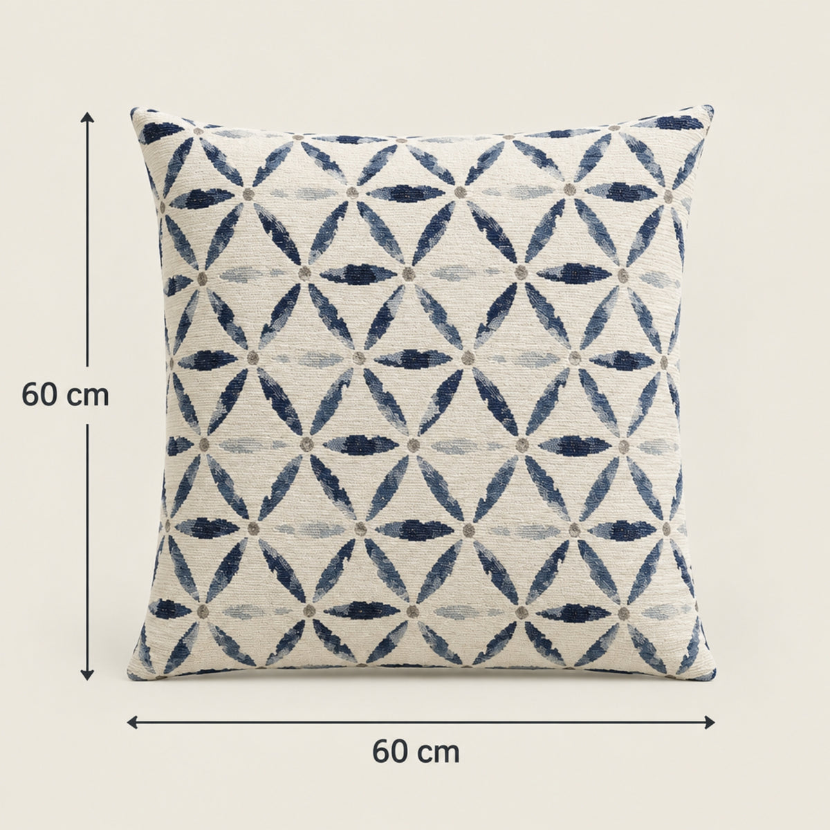 A square throw pillow with a geometric interlocking leaf pattern in navy blue and light gray on an off-white background, shown with dimension arrows indicating 60 cm by 60 cm.