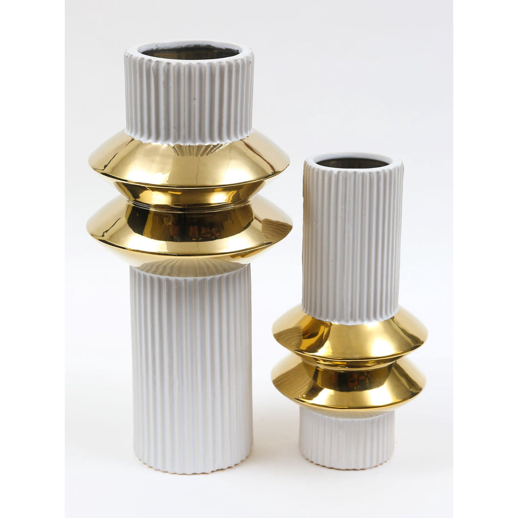 Two ribbed white ceramic vases with gold ring detail, large and small sizes