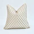Close-up of beige cushion geometric jacquard pattern