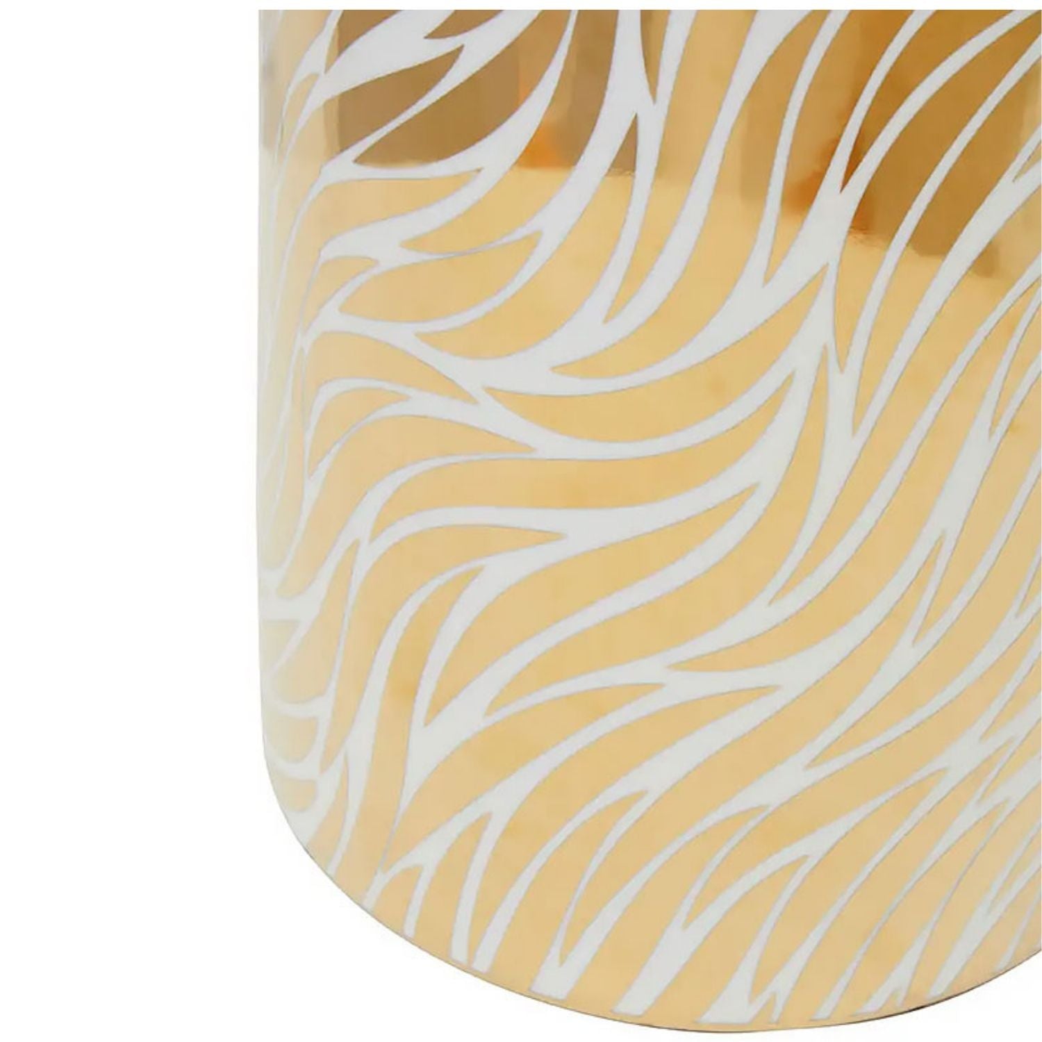 Close-up of a cylindrical product with a warm gold or champagne base and an etched or printed white wavy leaf-like pattern, shown against a plain white background.