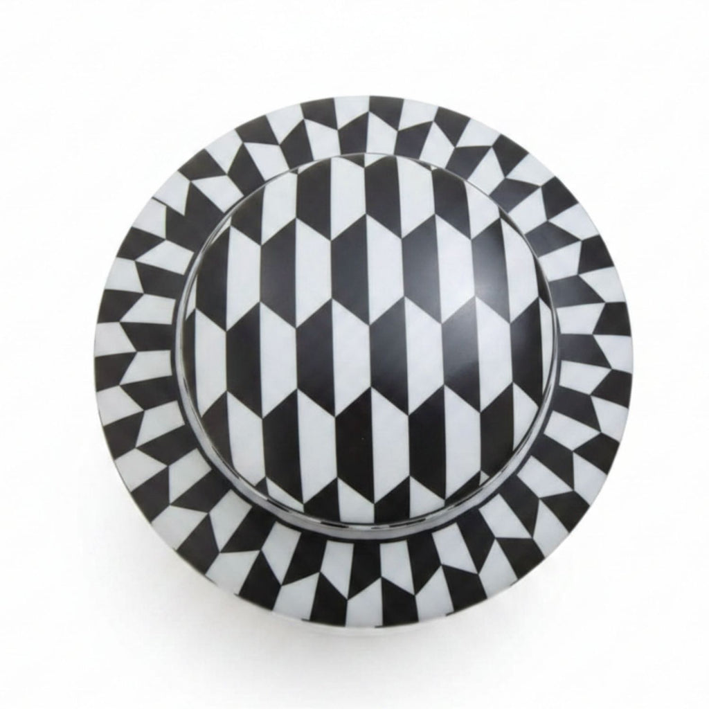 A round black and white geometric patterned cabinet knob or drawer pull with a 3D cube illusion design, shown from a top-down perspective on a white background.