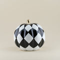 Black and white harlequin pumpkin ornament showing 21 by 21 by 20 centimetre dimensions