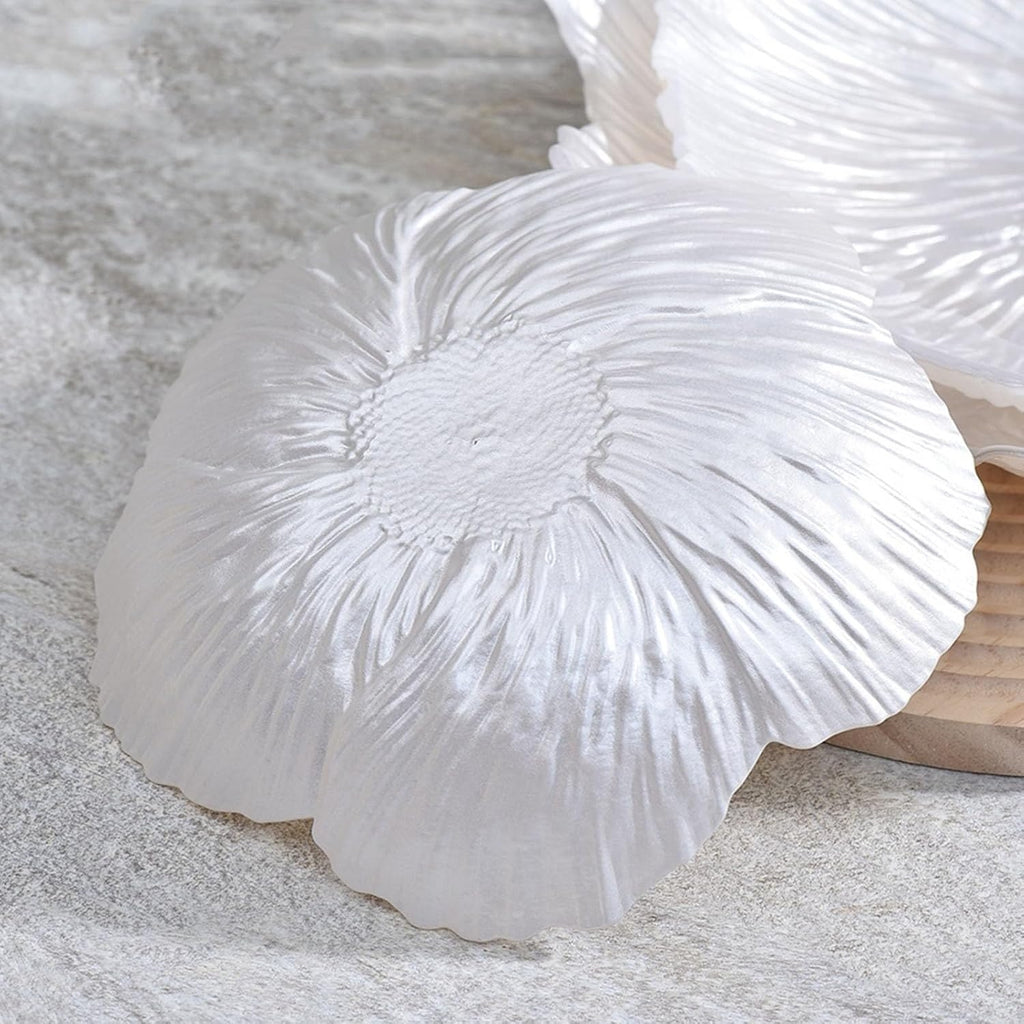 Crystal glass fruit plate shown in hand to highlight the fluted texture