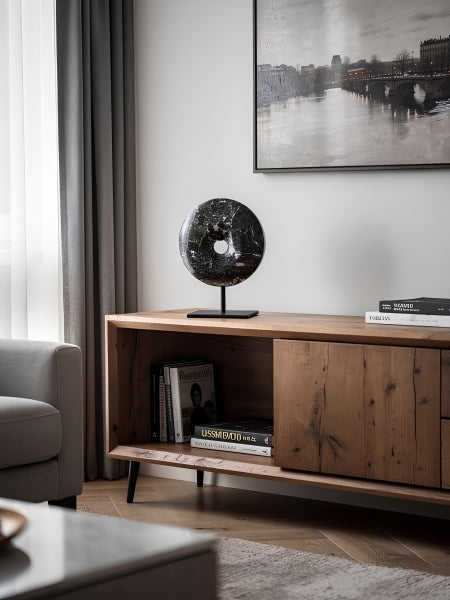 Toluca black marble disc sculpture with plant styling