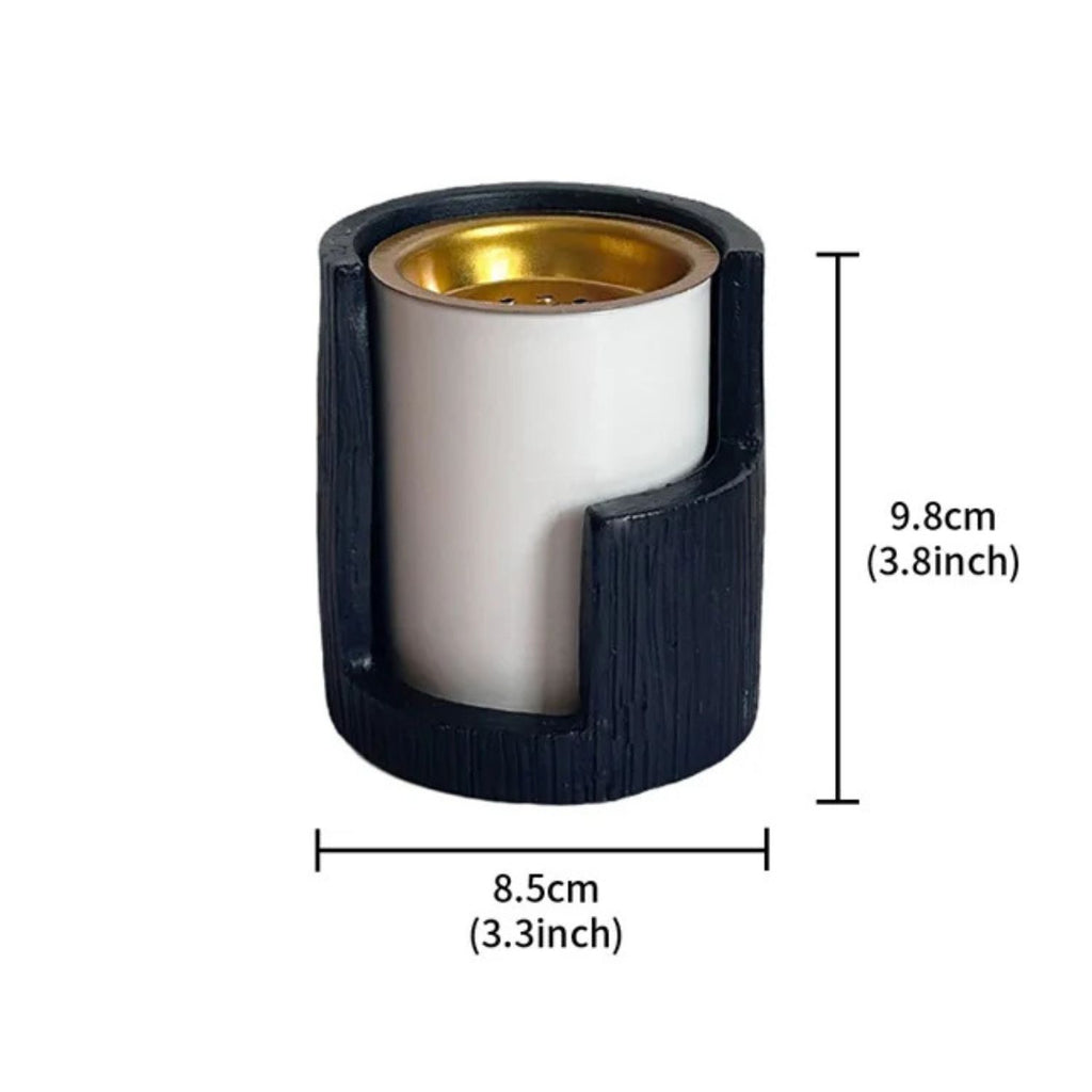 Black and white incense burner with gold-toned tray