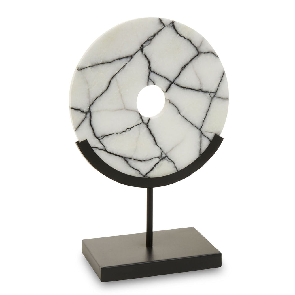 A round white marble plaque with black veining, mounted on a black metal stand with a rectangular base, shown against a plain white background.