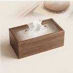 Wooden tissue box close-up on cream surface