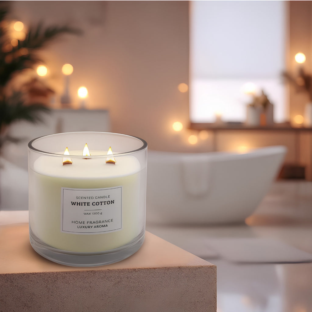 White Cotton candle lit in a luxury bathroom setting