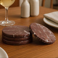 Salmo Red Marble Coasters - four coasters flat lay