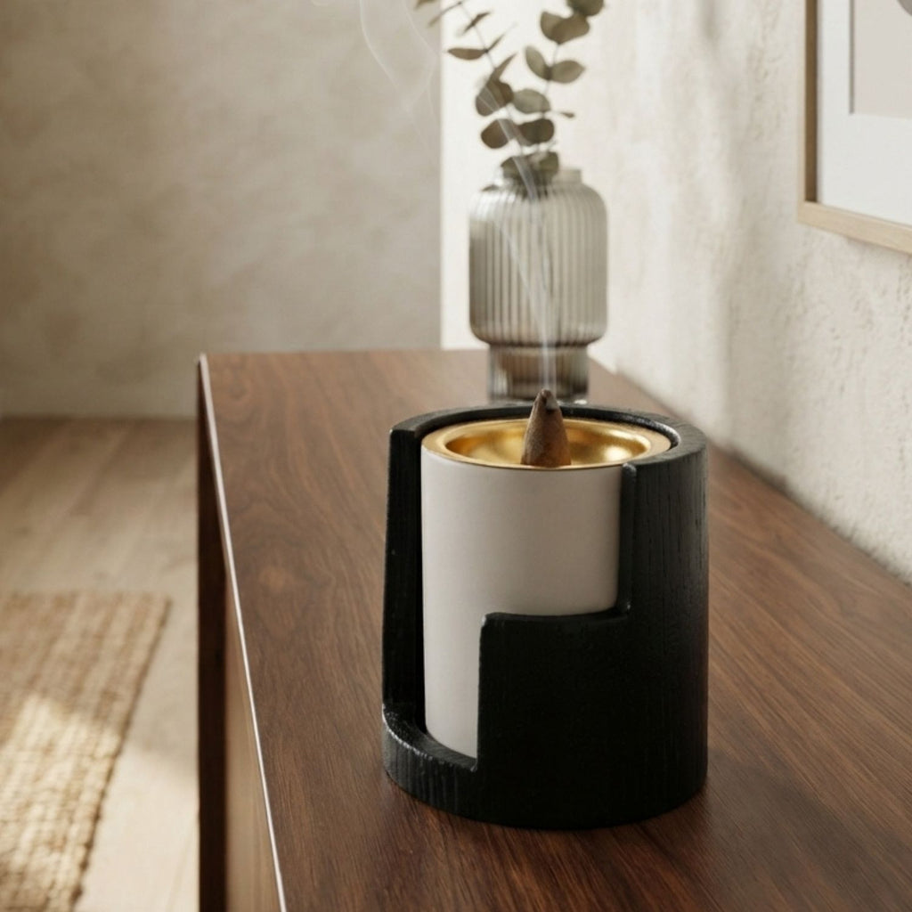 Black and white incense burner with separate gold-toned tray