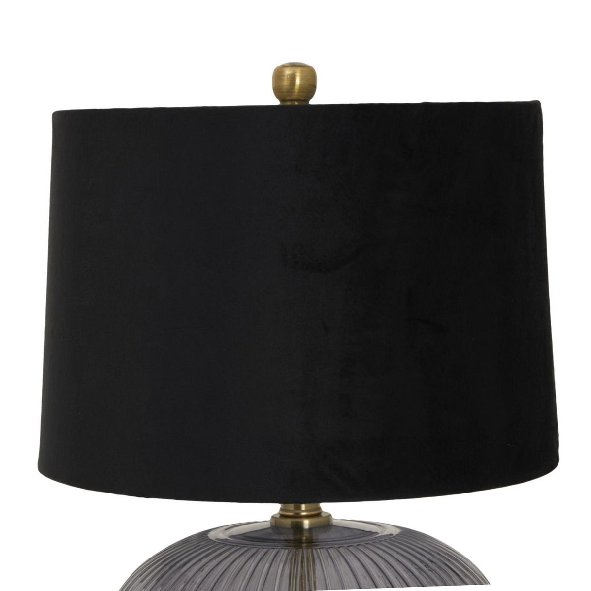 Luxton table lamp with black shade and smoky ribbed base on a bedside table