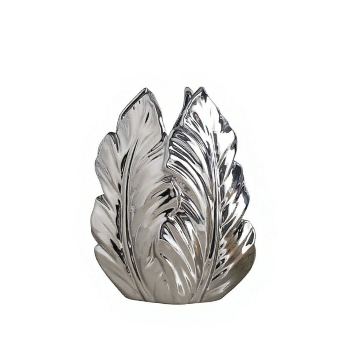 A polished silver metallic decorative object shaped like two overlapping leaf-like forms, photographed on a plain white background.