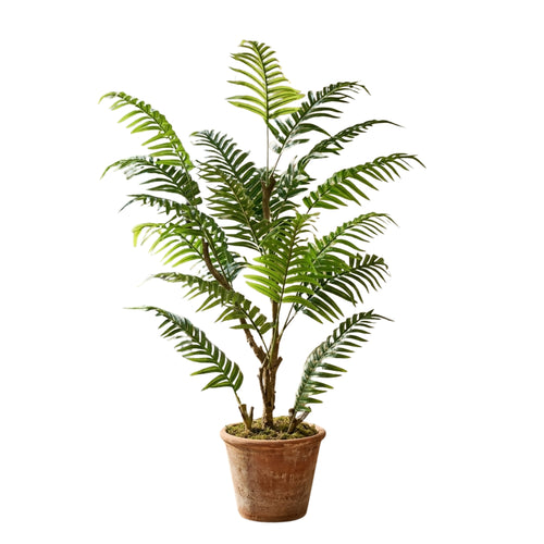 An artificial fern plant in a terracotta-colored plastic pot, shown against a solid white background.