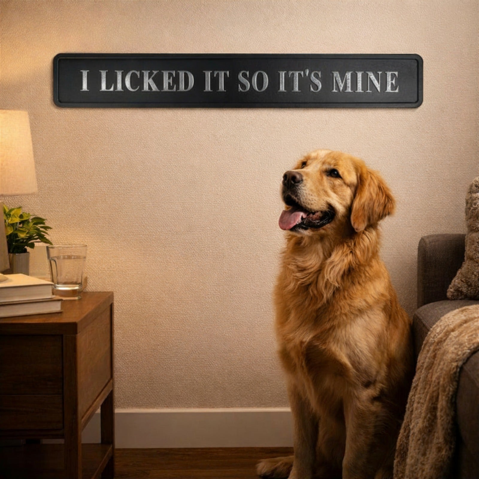 I Licked It So It's Mine sign on tile wall
