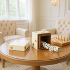 Ivory and gold dice box closed on bookshelf