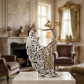Gold dancing lady sculpture on marble console table in luxury interior
