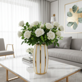 White and gold stripe tall ceramic vase with white roses