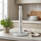 Marble paper towel holder styled with herbs and linen in luxury kitchen